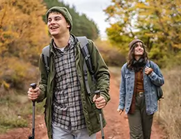 two young adults hiking